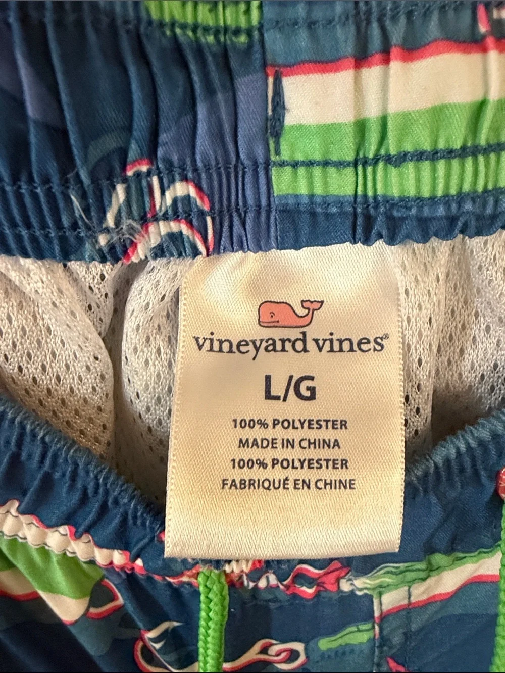 Vineyard Vines Blue Swim Trunks with Green and Pink Lure Print